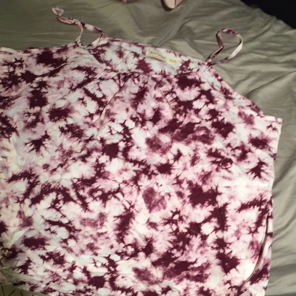 A cute tank top 2X runs a size small
